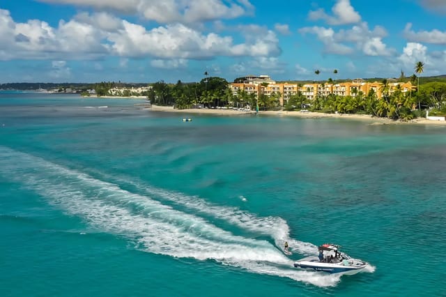 Drone view of Saint Peter's Bay with boat in turquoise waters